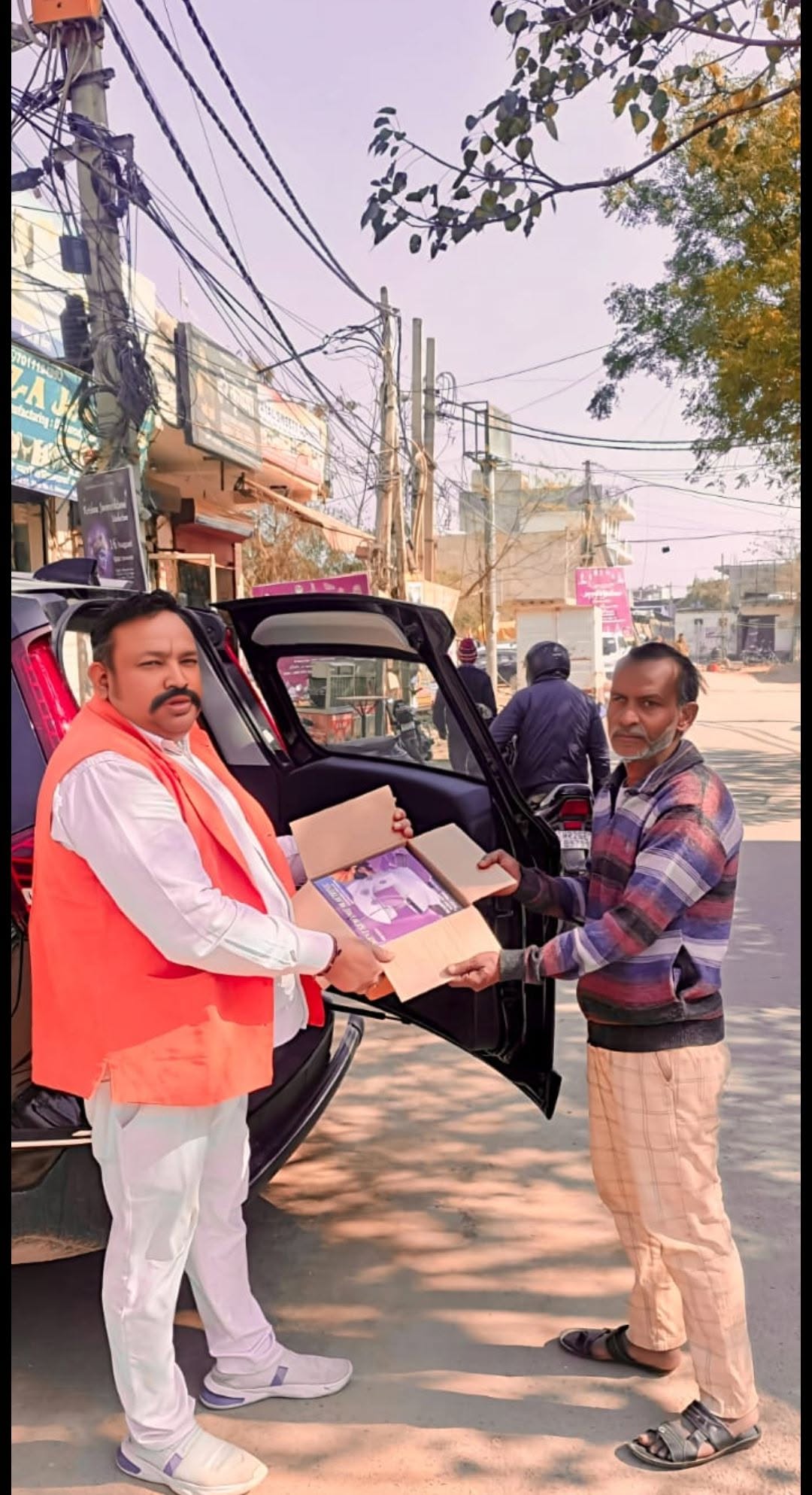 गर्व का क्षण mere liye and हमारी कॉलोनी के लिए 🇮🇳 — Photo 3 – Distribution activity by Purvanchal Morcha